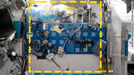 The yellow dotted line indicates the location of a sample for the Quadruple Sample Assemblies Research Experiment, part of the NASA Node 2 (Harmony) module correct workstation on the International Space Station, photographed January 15.