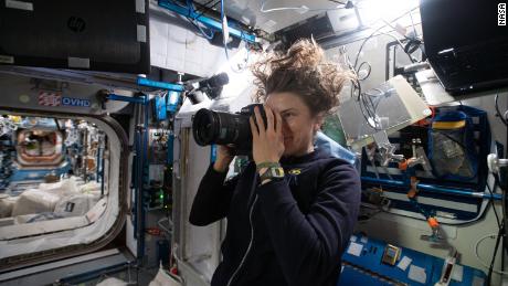 NASA astronaut Kayla Barron snaps an image of the sample location on the US Module Node 2 (Harmony) at the International Space Station for the Quartet Search Experiment on Jan. 15.