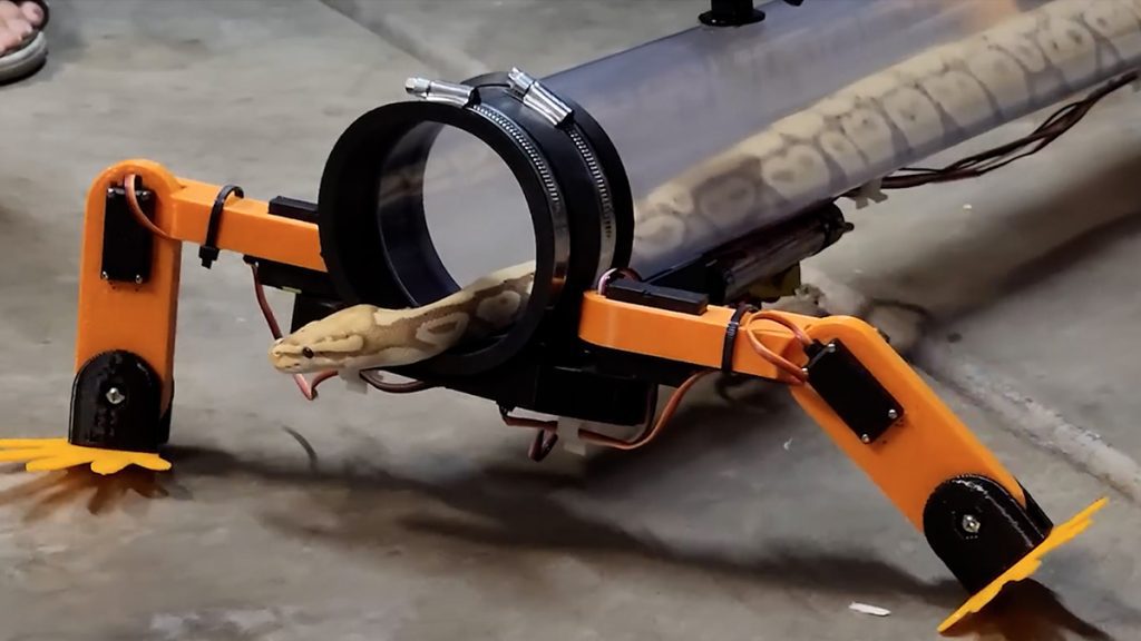 YouTuber's Crazy Idea: Build a robotic exoskeleton to do a snake walk.  And it works (but under human control) - video