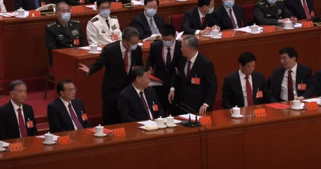 China, former President Hu Jintao is escorted by the Communist Party Congress in front of Xi Jinping