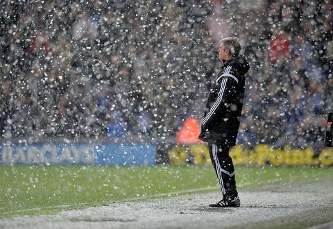 West Bromwich Albion manager Alan Irvine watches his team lose 1 3 in the snow on Boxing Day. Photo by Amcorpis via Getty Images